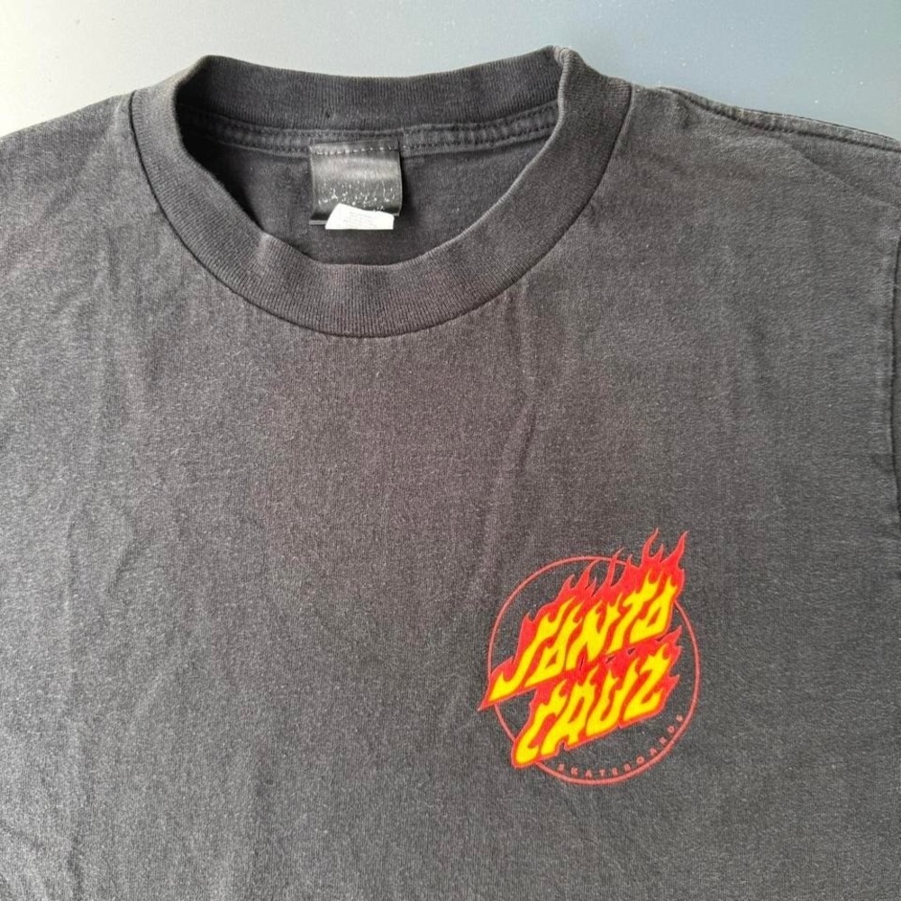 Vintage Sun Faded Santa Cruz skateboarding flame logo tee in black and red skate
